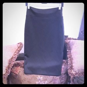 Black skirt with a slit on the side